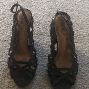 Black leather wedge sandals